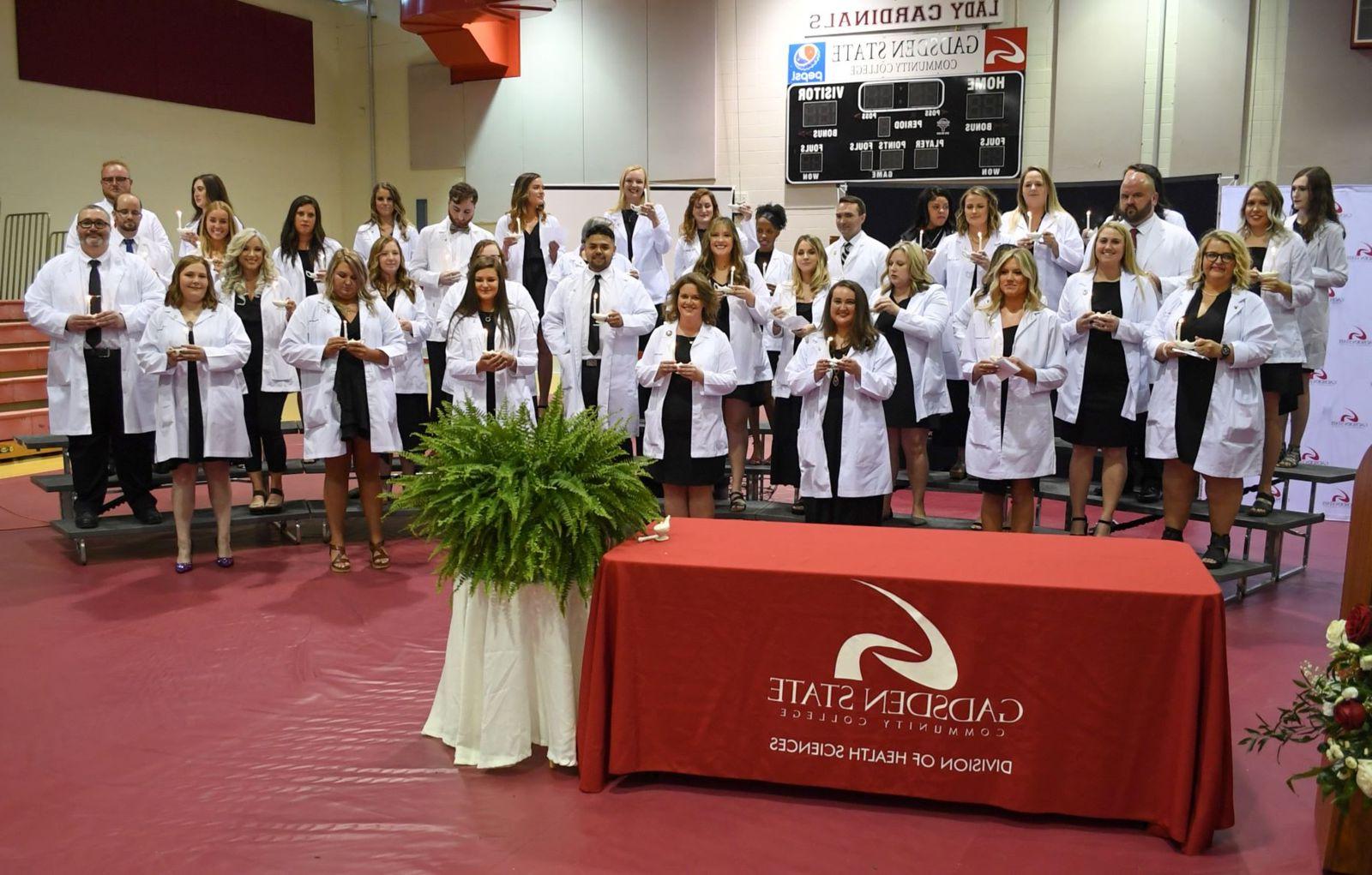 Nursing students after receiving their pins during a ceremony at Beck Field House